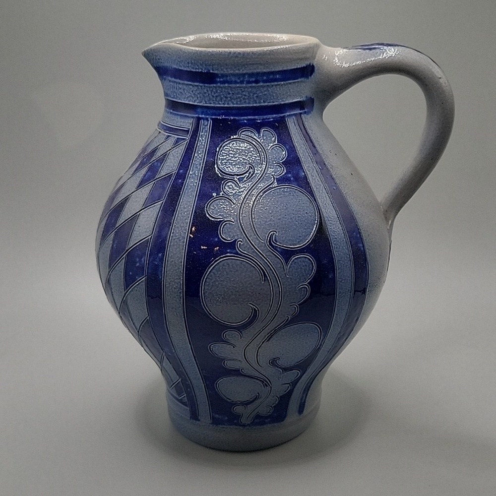 Blue and gray stoneware pitcher.  1 litre. 8" high.